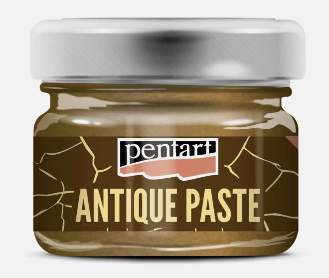 A jar of Pentart Antique Paste, featuring a metallic silver lid and a dark brown label with gold crackle details and cream lettering, set against a plain white background. Antique Gold Paste.