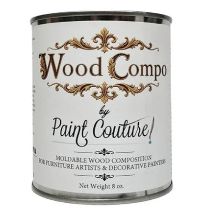 A 8 oz can of Wood Compo by Paint Couture moldable wood composition paint, featuring a white label with elegant gold and black typography on a clean white background.