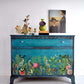 Turquoise cupboard decorated along the bottom half with animals from Iron Orchid Designs Bungalow transfer