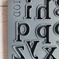 Iron Orchid Designs Harper grey silicone mould close up of individual letters in the mould