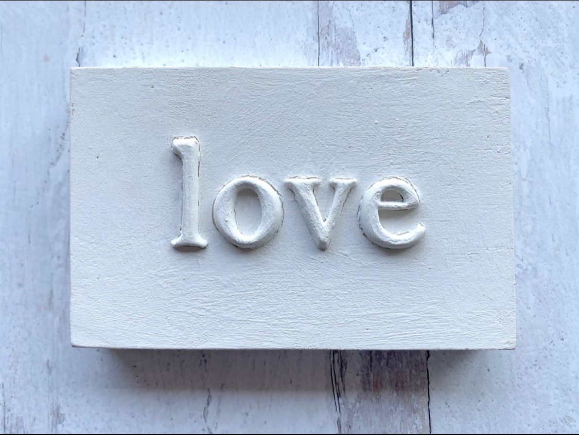 White typography sign spelling love in white letters from Iron Orchid Designs Harper Mould
