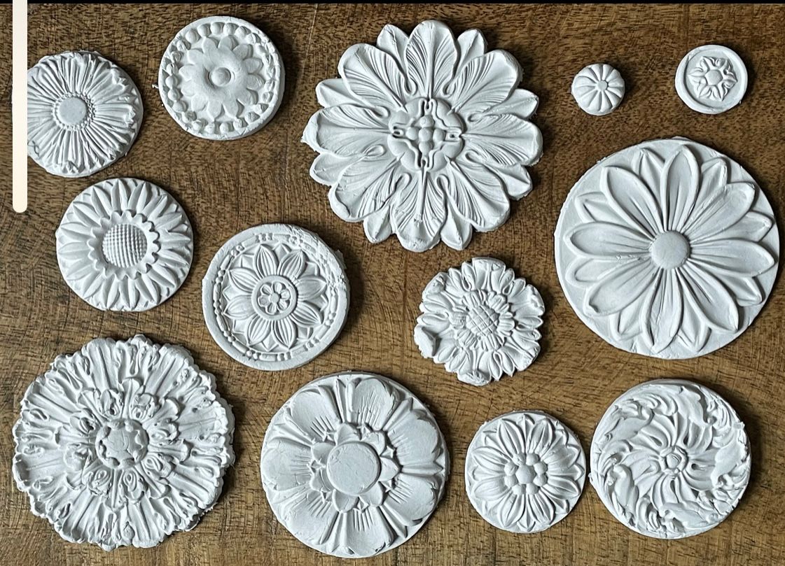 Iron Orchid Designs Rosettes Mould circular white decorative castings made out of clay