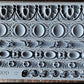 Iron Orchid Designs Trimmings Three decorative trims grey Mould laying on a wooden surface