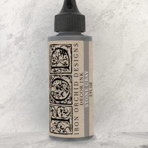 Iron Orchid designs Stone Gray ink bottle on a white background