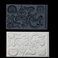 Iron Orchid Designs Classic Elements grey Mould above white castings of the mould