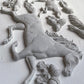 White clay castings from Iron Orchid designs Horse and Hound mould
