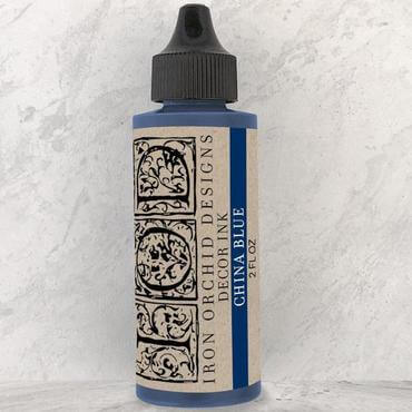 Iron Orchid Designs China Blue ink bottle on a white background