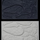 Iron Orchid Designs Wings & Feather grey Mould above white clay castings of the mould